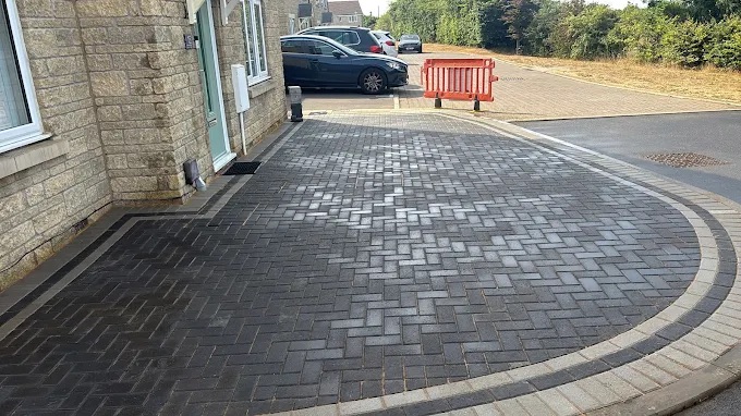 Tarmac driveway with block paved border in Warminster