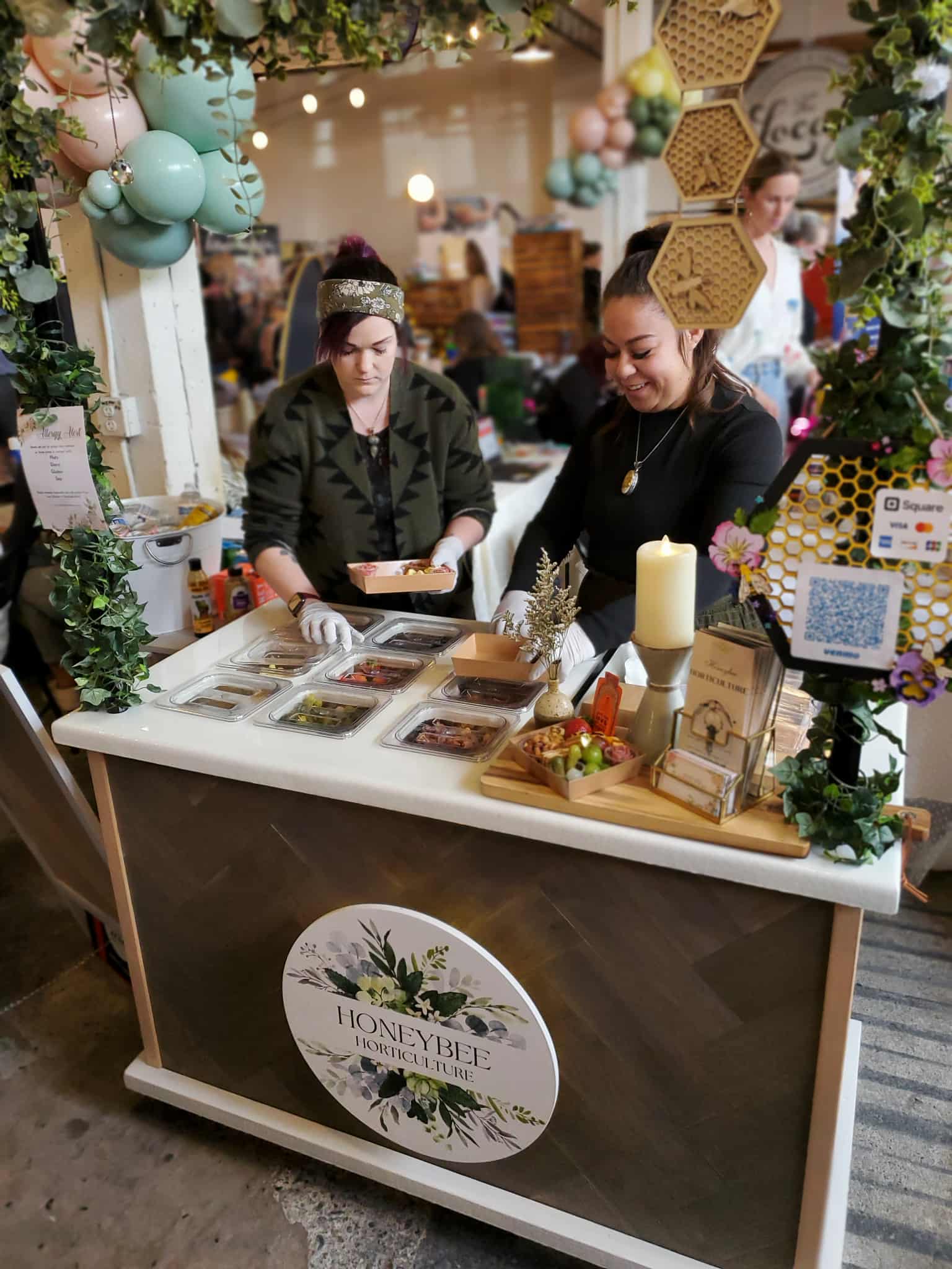 Honeybee Horticulture mobile charcuterie cart team serving corporate events in Kitsap County and Seattle