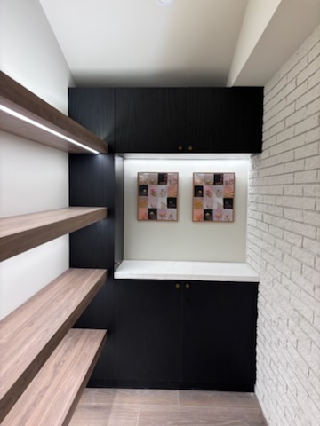 Built-in Cabinetry, Floating Shelves & Brick Accent Wall in Las Vegas, Nevada | Desert Gold Home Services