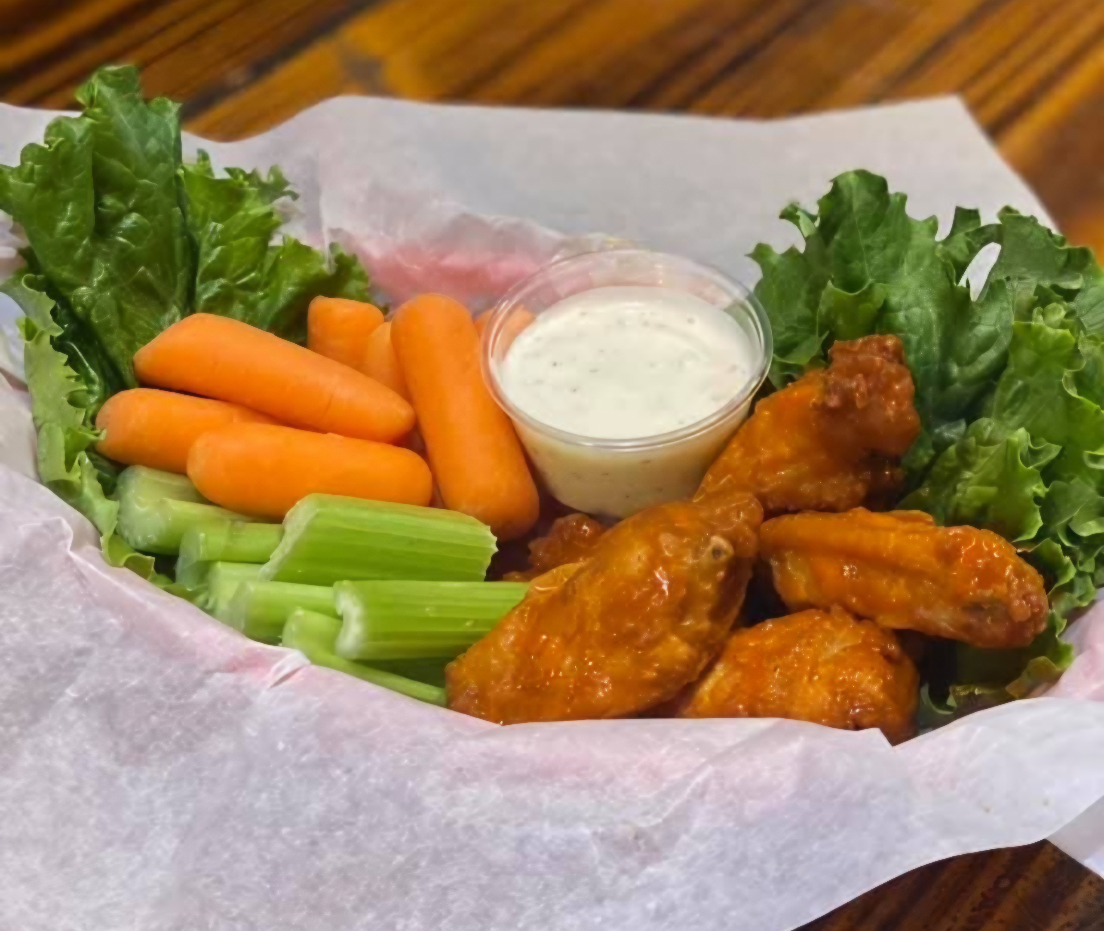 Wildhorse Bar and Grill chicken wings basket with carrots, celery, and ranch dipping sauce