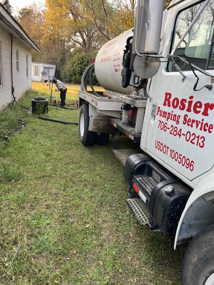 Rosier Pumping Service vacuum tanker on residential site in Augusta