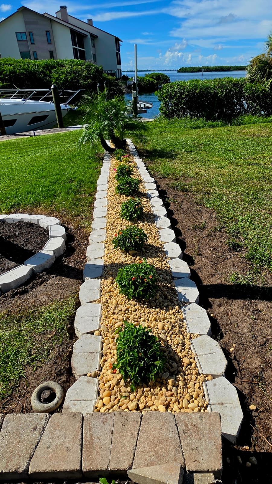 waterfront decorative rock edging and stone border installation in Bradenton FL
