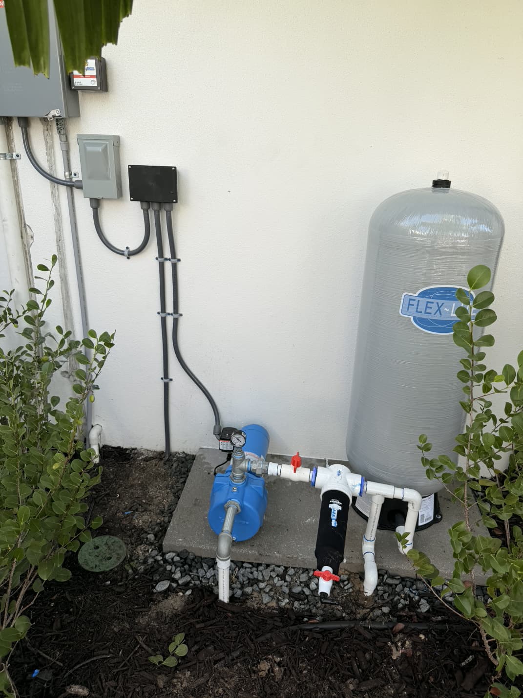 residential irrigation well booster pump, spin-down sediment filter, and Flex-Lite pressure tank equipment installation