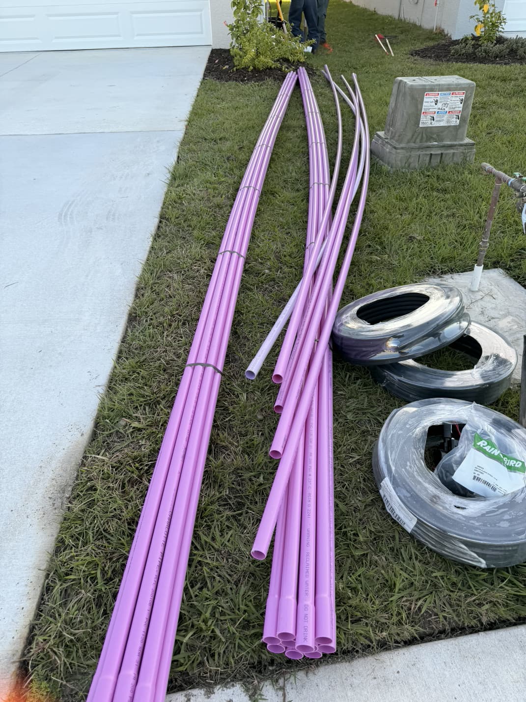 commercial reclaimed water purple PVC pipes and Rain Bird irrigation tubing ready for installation
