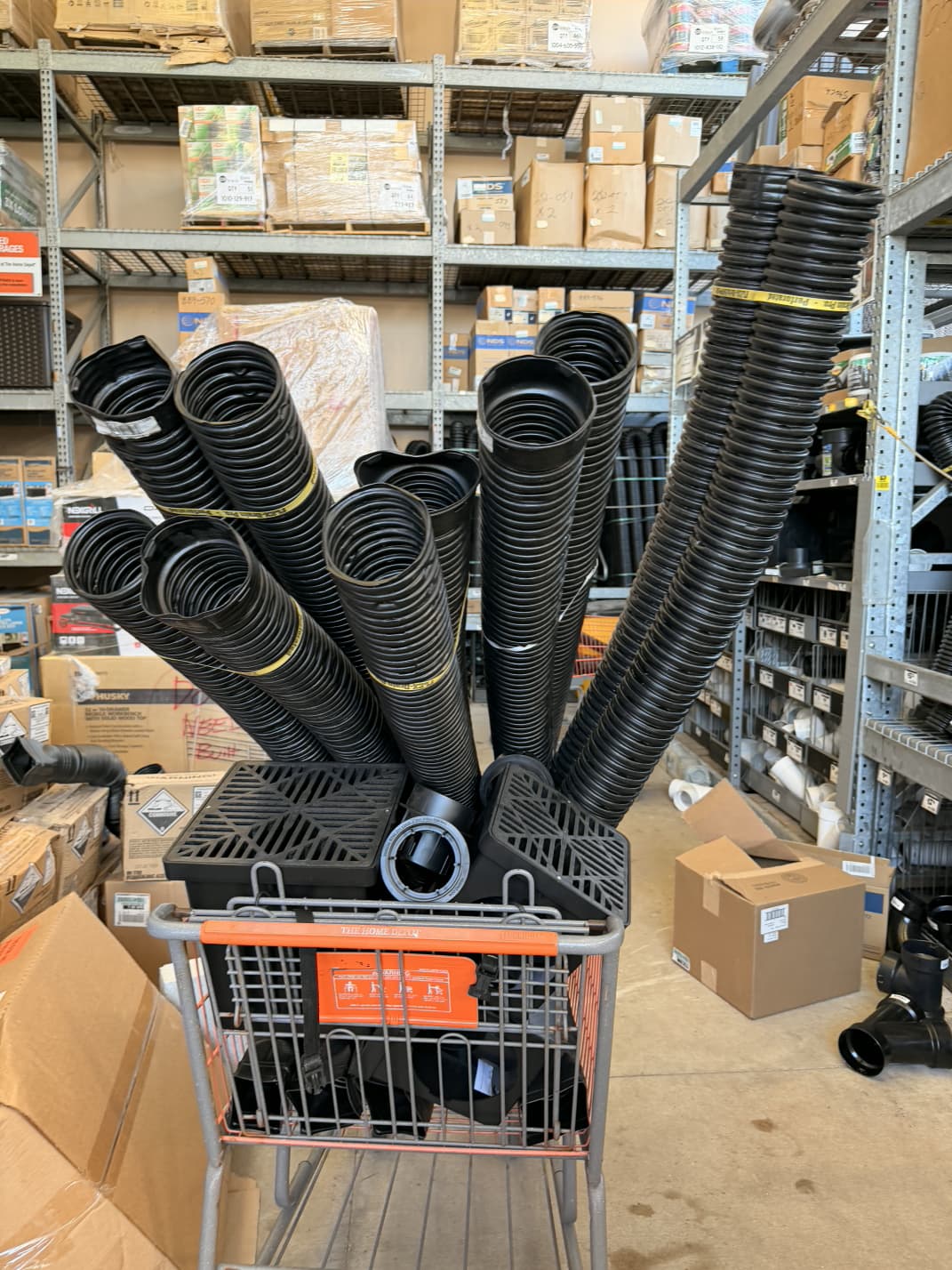 commercial drainage materials including NDS catch basins and corrugated French drain pipes