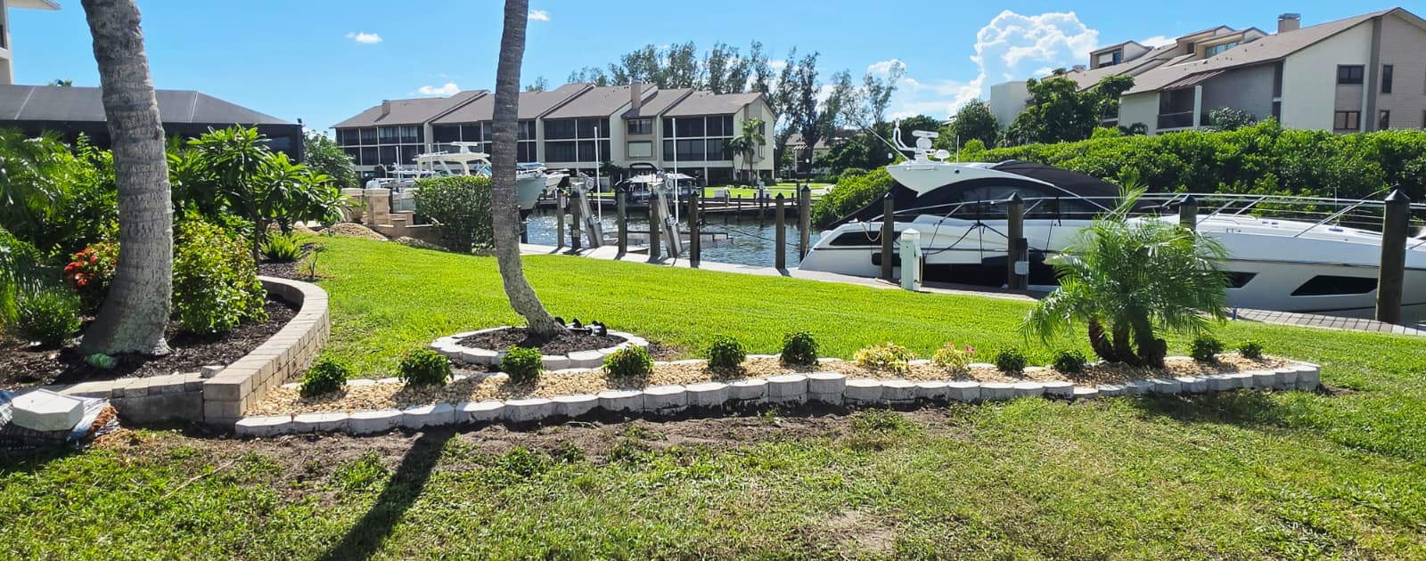 waterfront landscape retaining wall and rock edging project in Venice FL