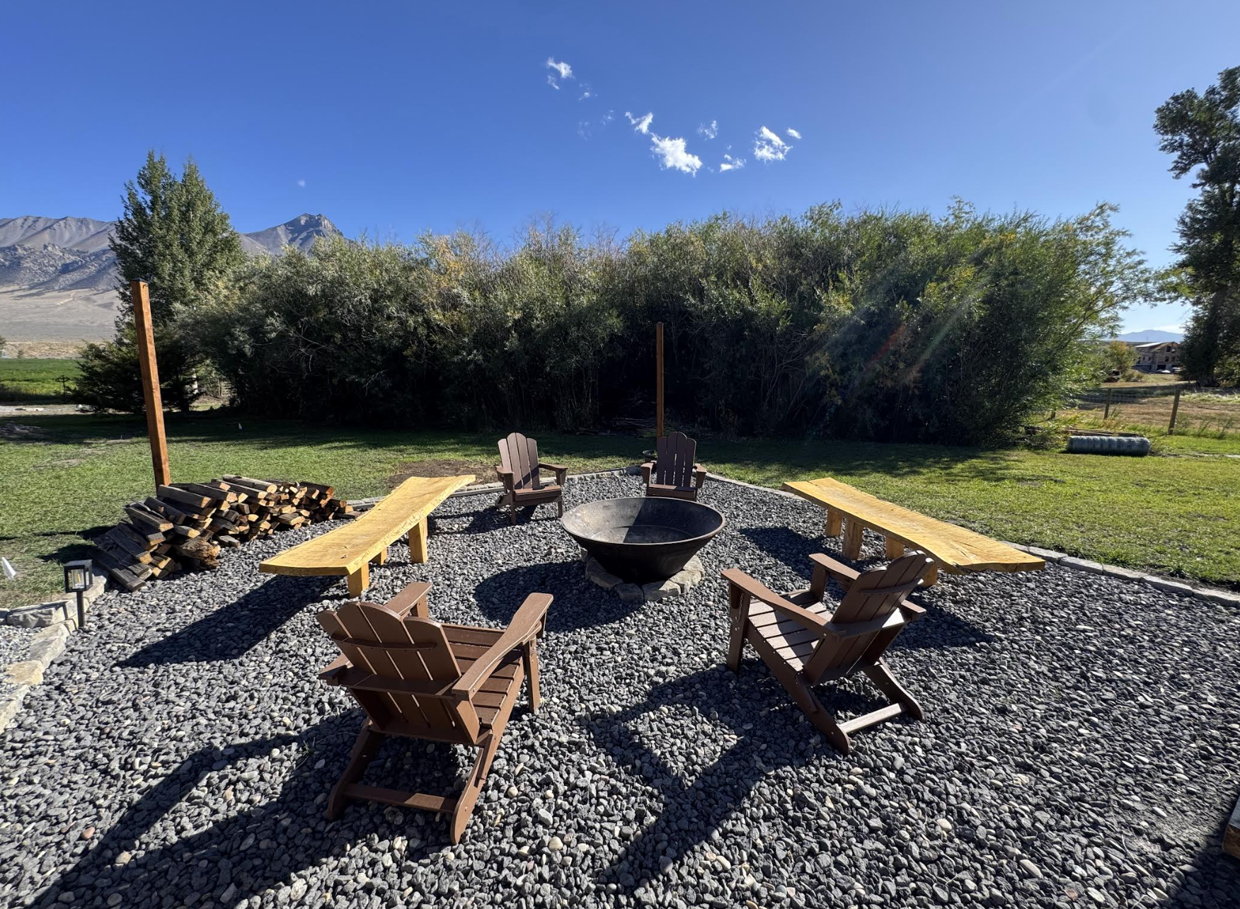 Outdoor firepit lounge with mountain view