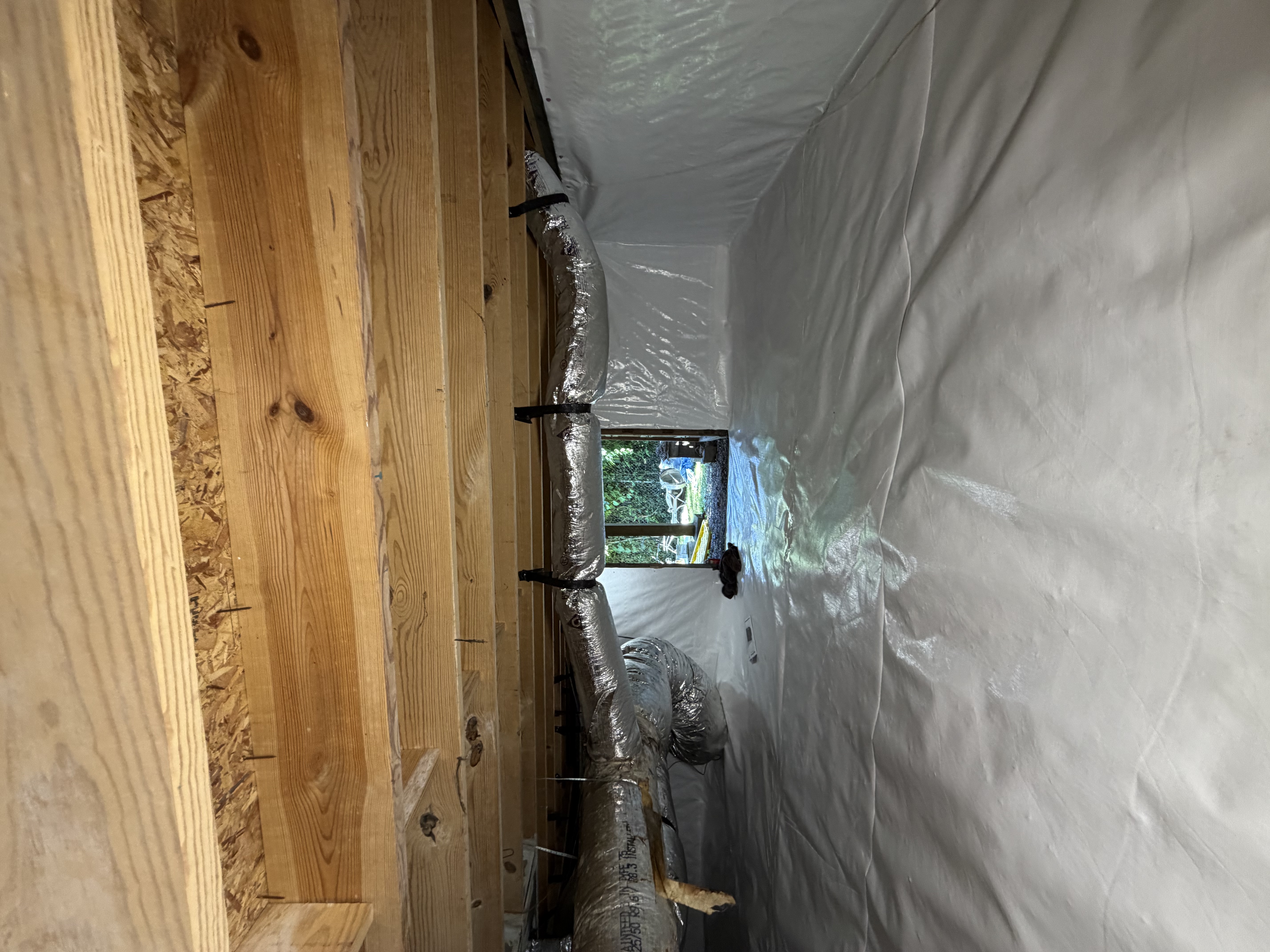 Crawl space moisture control, floor joists, and vapor barrier installation by Crawlspace Hero in Middle Tennessee