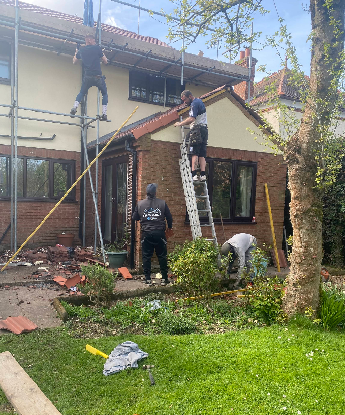 Linc's Roofing On-Site Team on Scaffolding