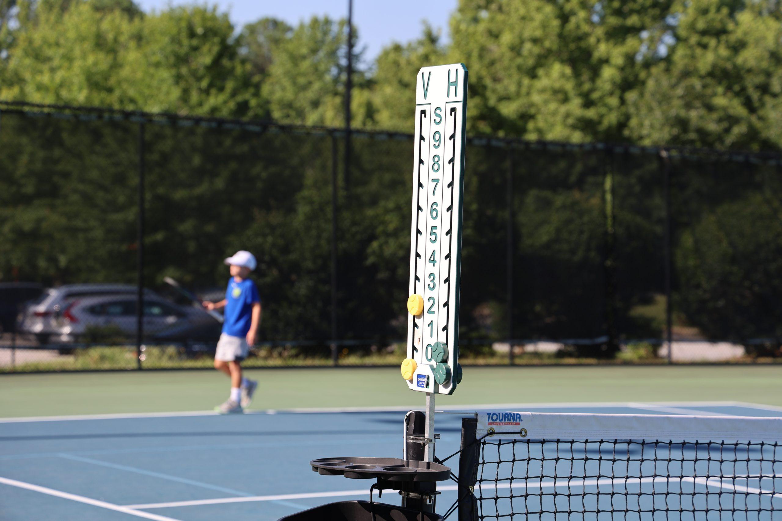 Official court scorekeeper tower during competitive junior set