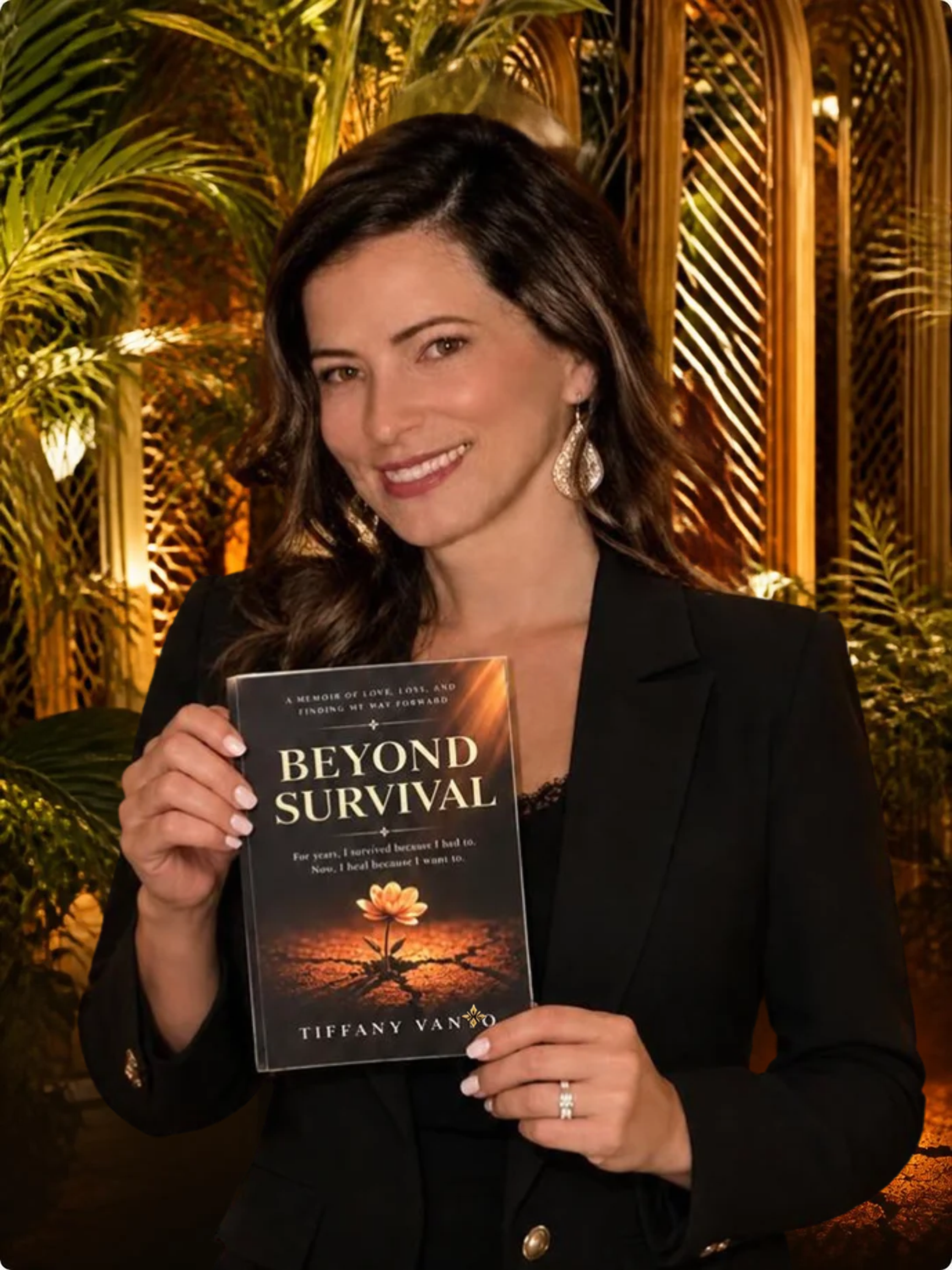 Tiffany Vanyo holding BEYOND SURVIVAL