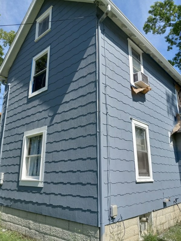 Two-Story Slate Blue Siding Painting & Trim