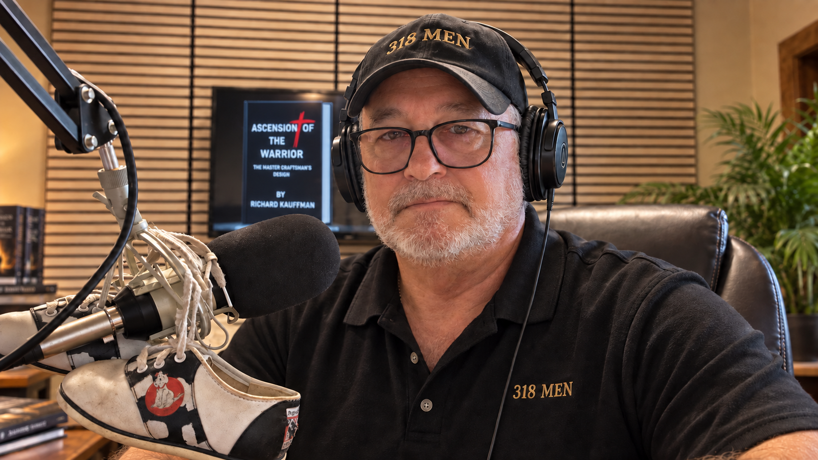 Rick Kauffman recording The 318 Brotherhood Podcast in studio with headphones, microphone, and Kelsey's shoes.