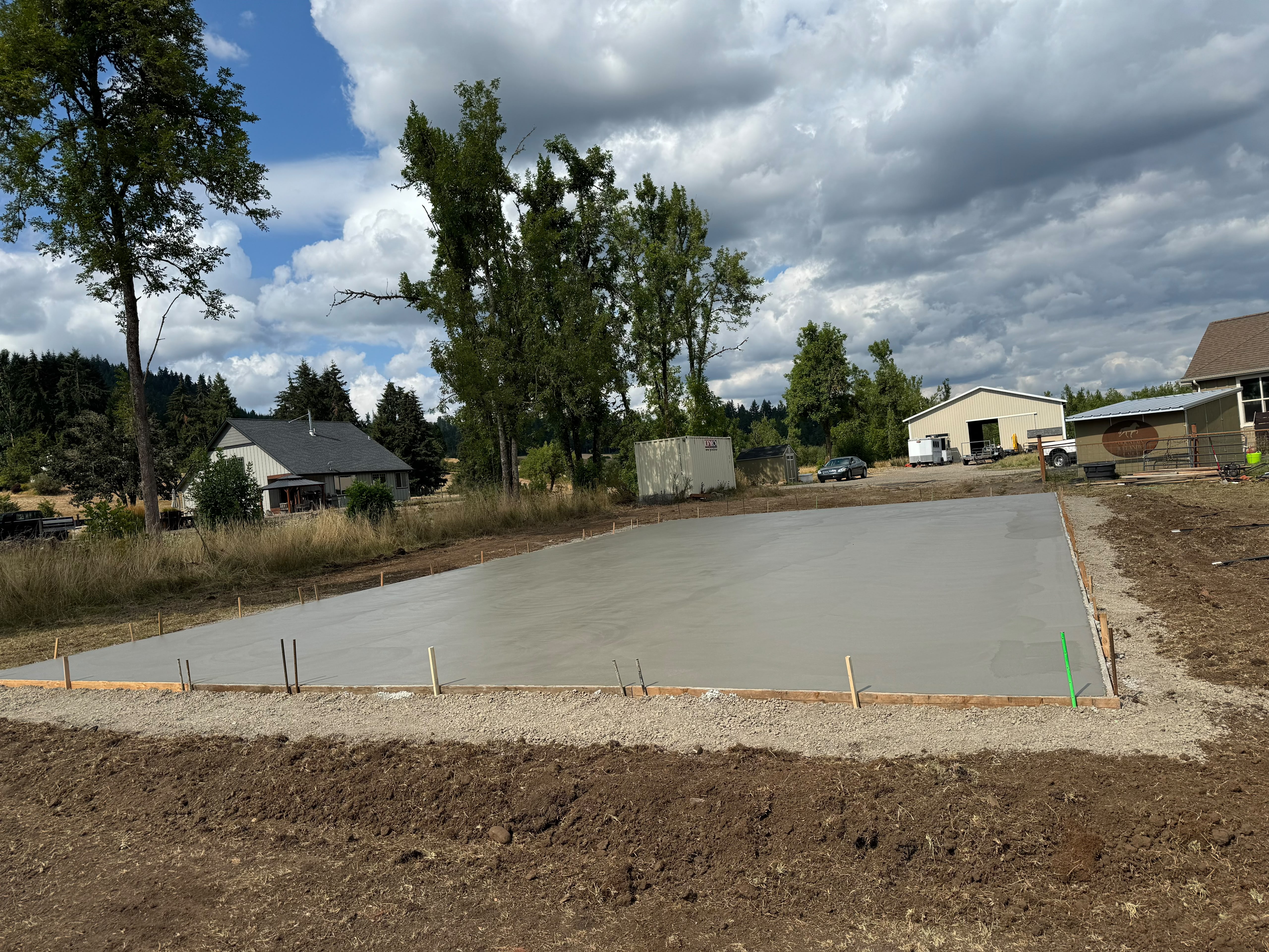 rural outbuilding monolithic concrete foundation slab poured on gravel sub-base in Silverton OR by Foothills Concrete LLC
