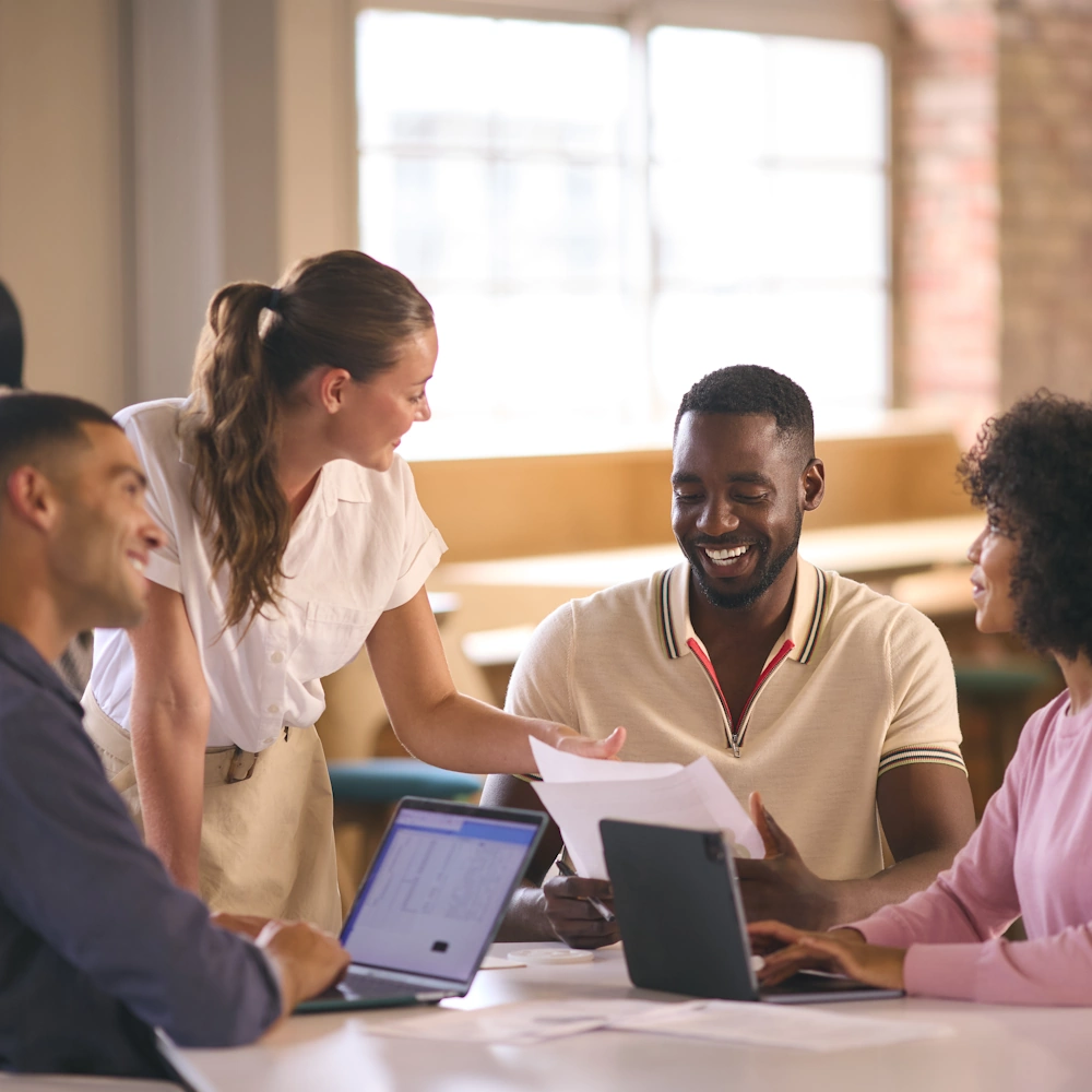 Business team collaborating on customer systems and processes