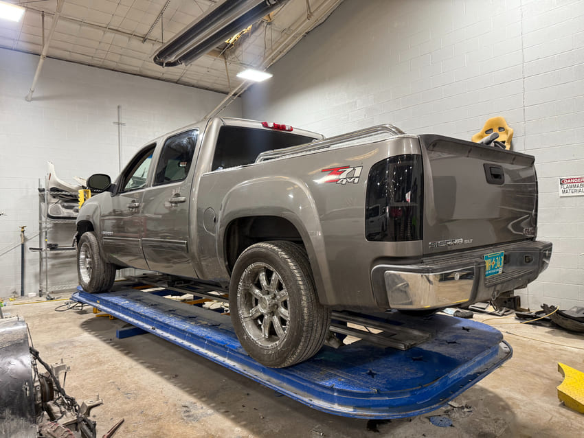 Automotive painting and refinishing inside professional spray booth