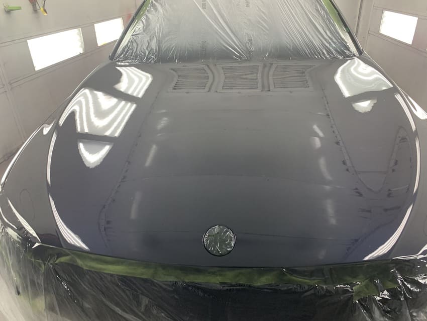 Vehicle door ding removal and surface smoothing