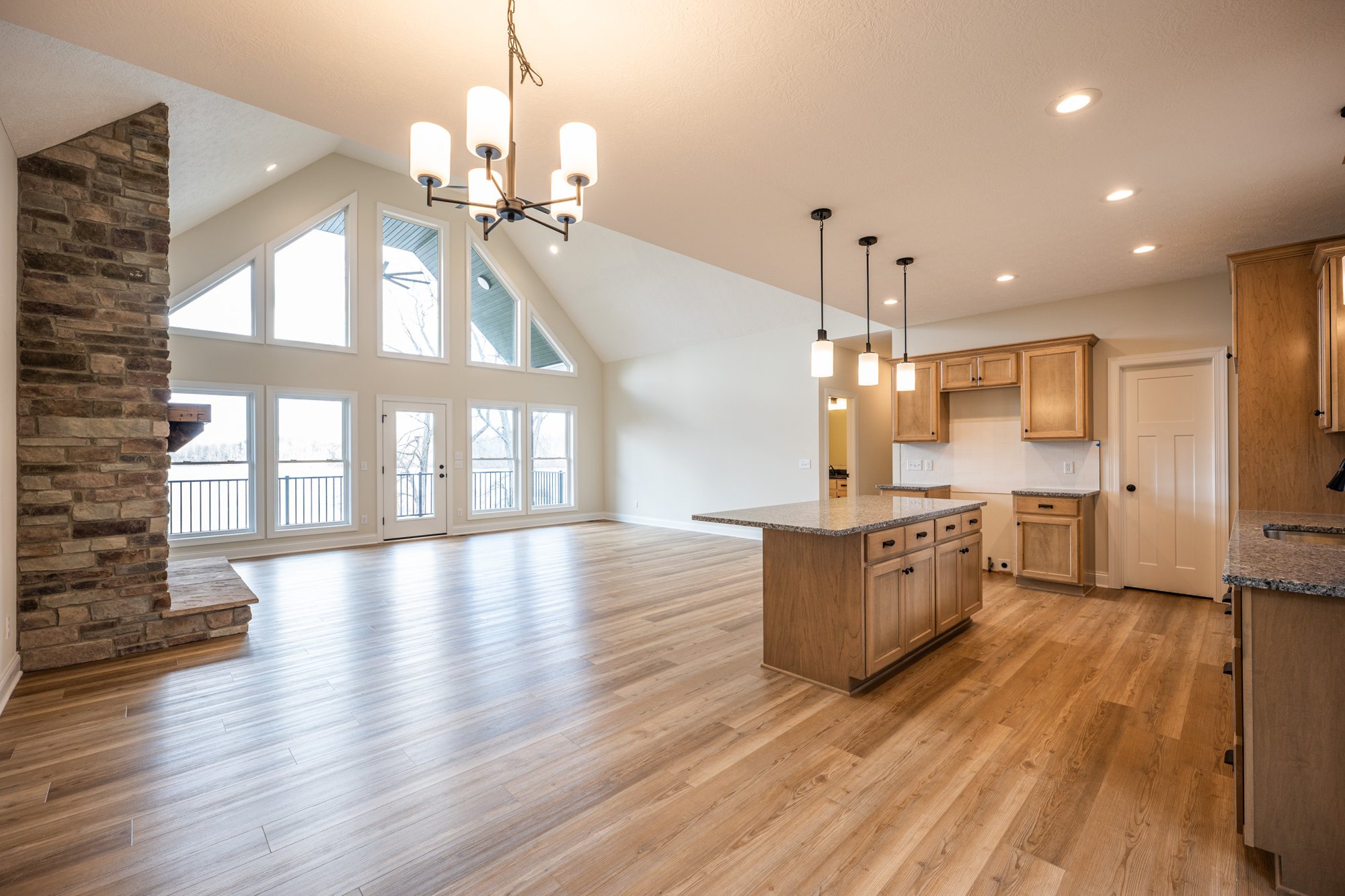 Vaulted living room and kitchen interior photography