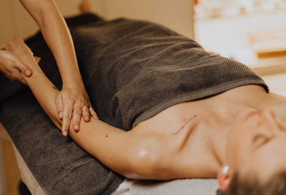 Hands-on aesthetic massage and skin wellness therapy session