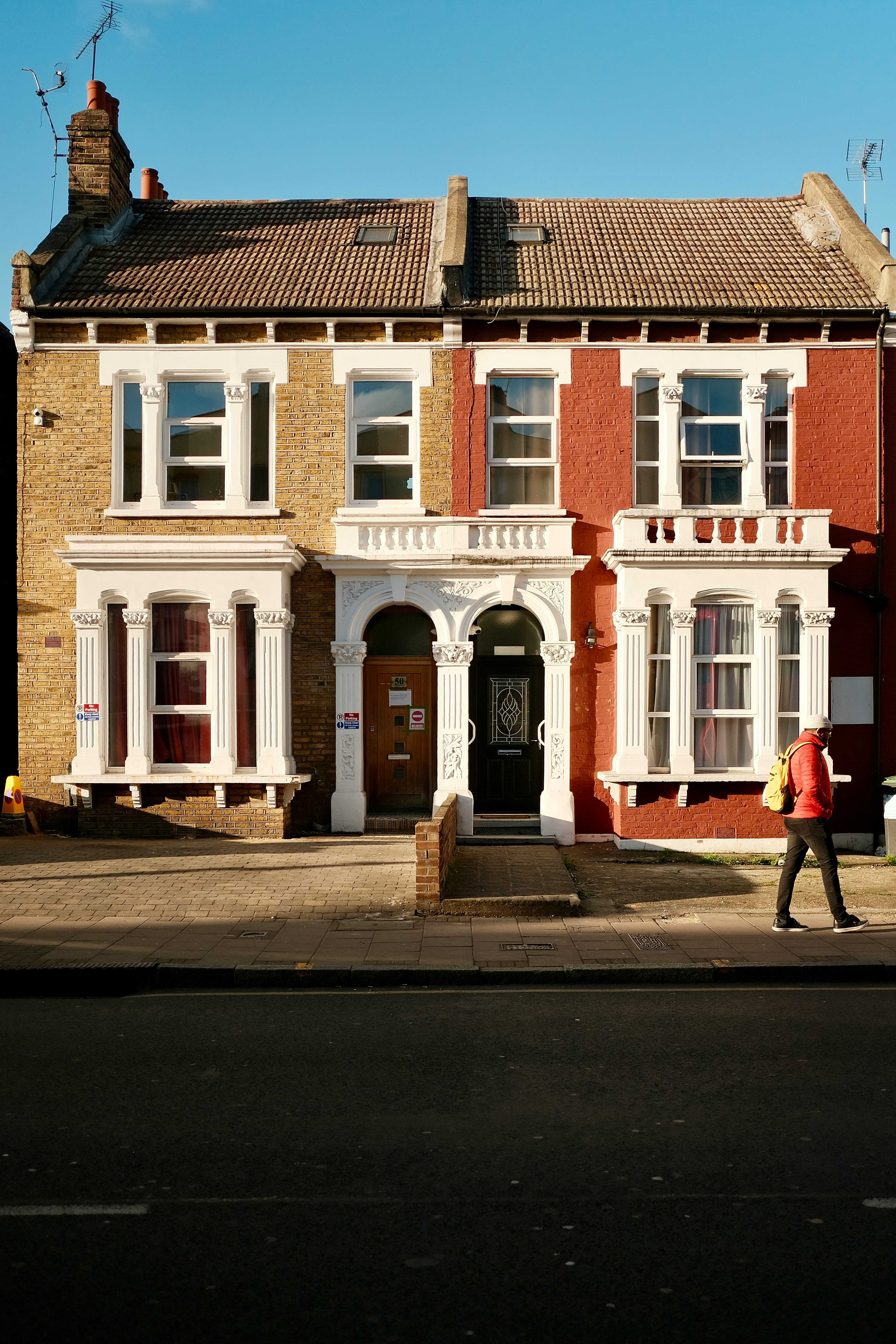 Exterior townhouse restoration and painting completed by Multi Purpose Home Improvements