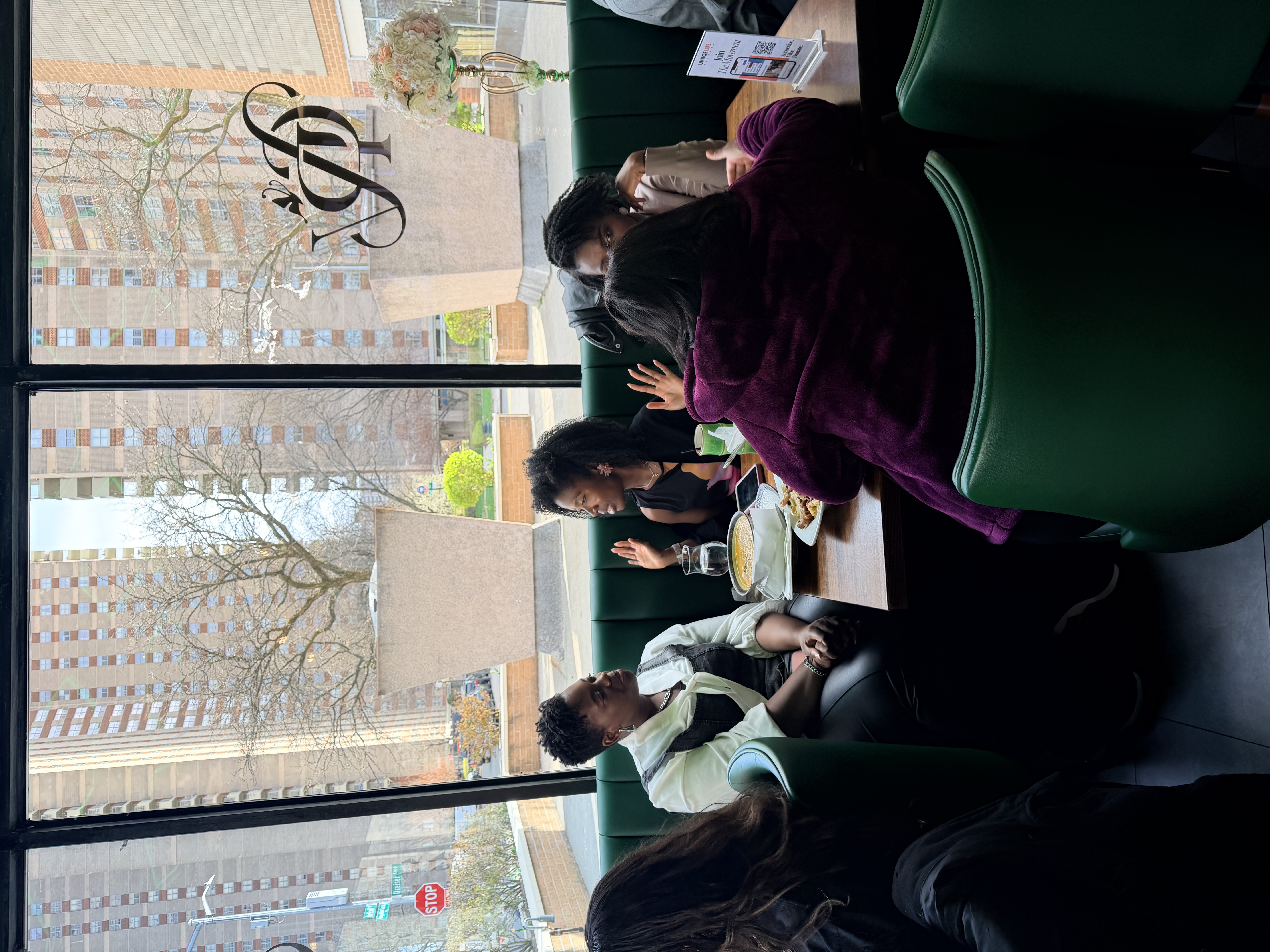 Brunch table conversations with friends and attendees