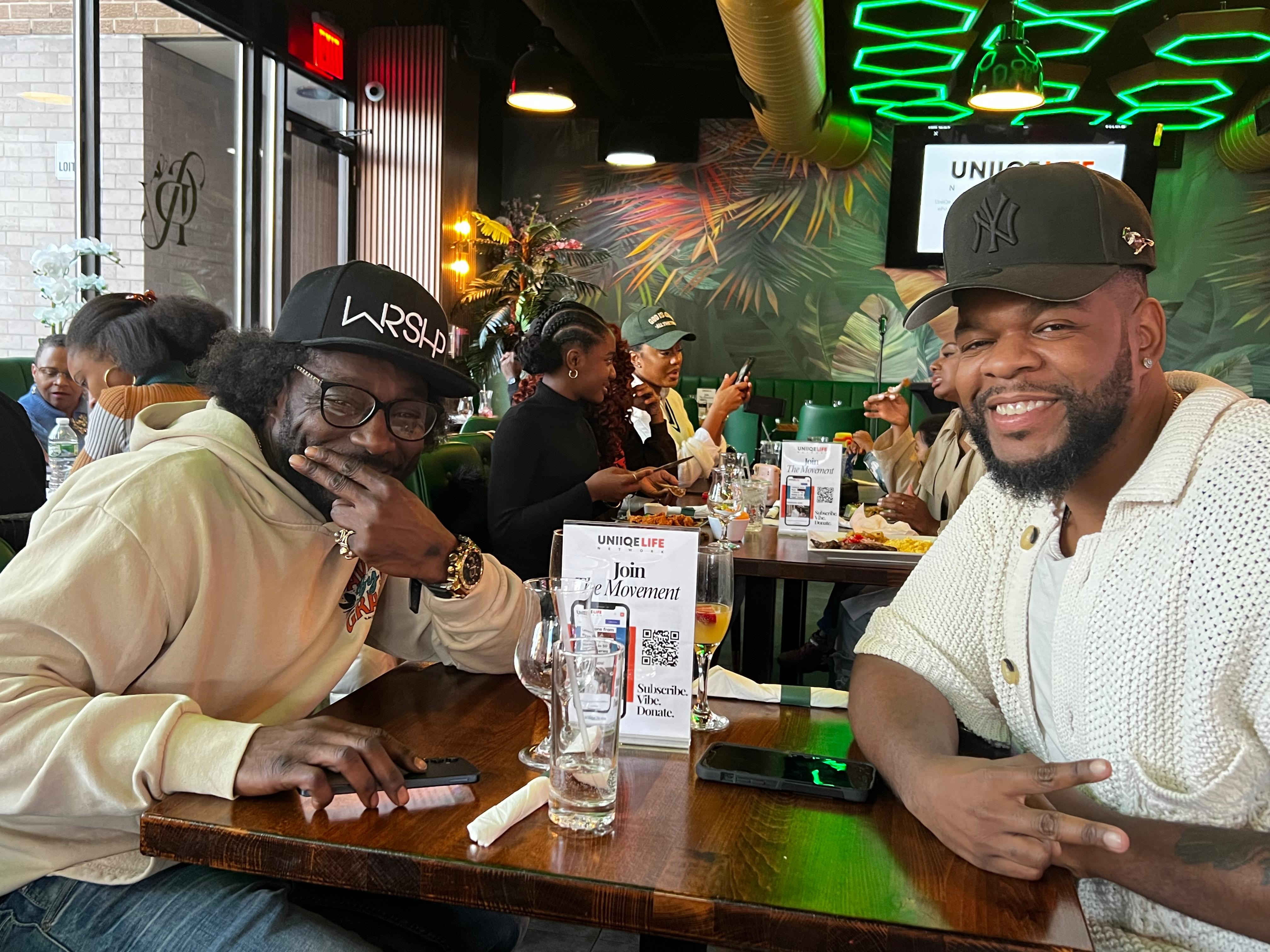 Guests smiling and connecting at The After Church Brunch table
