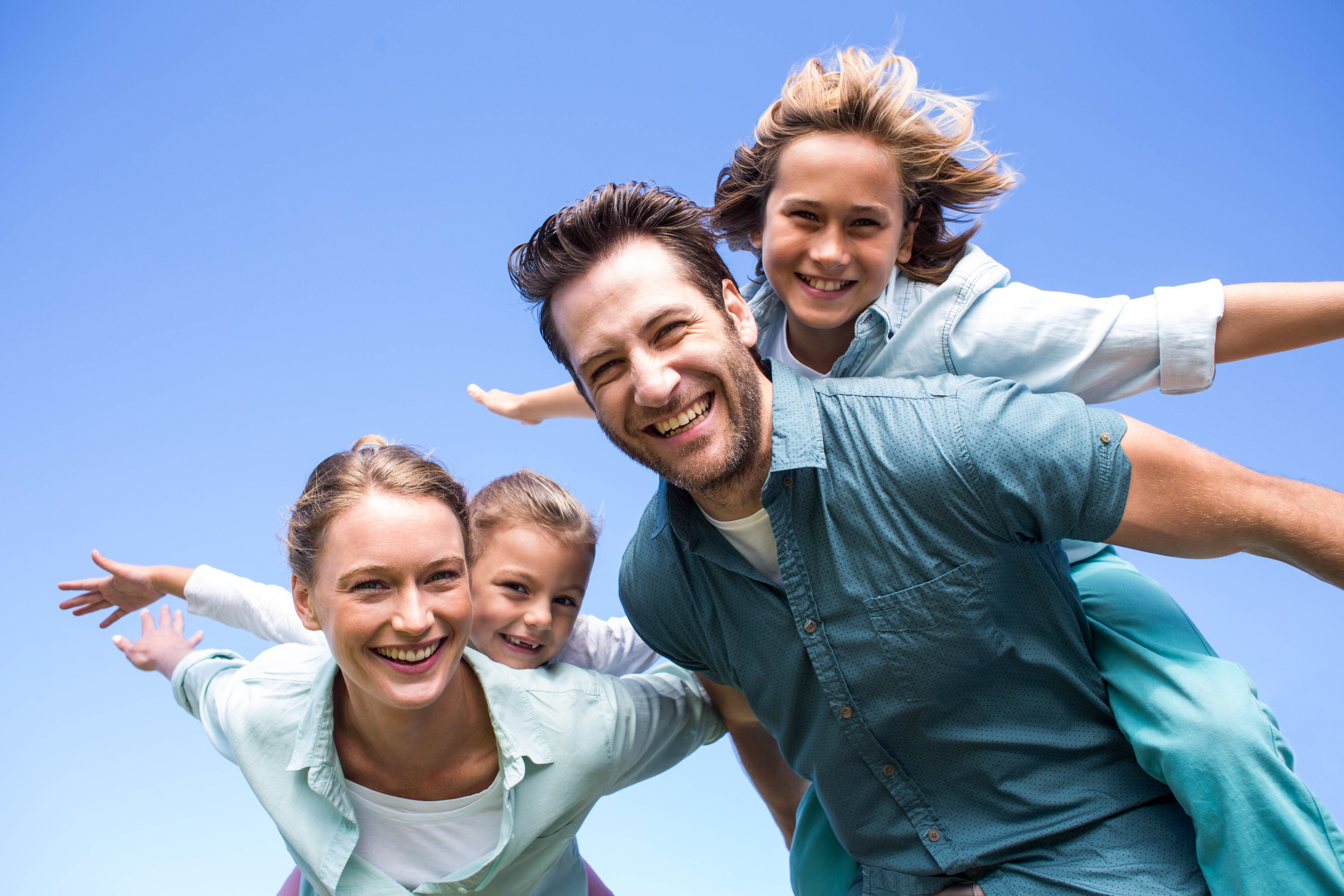 Happy family smiling together in Nanaimo