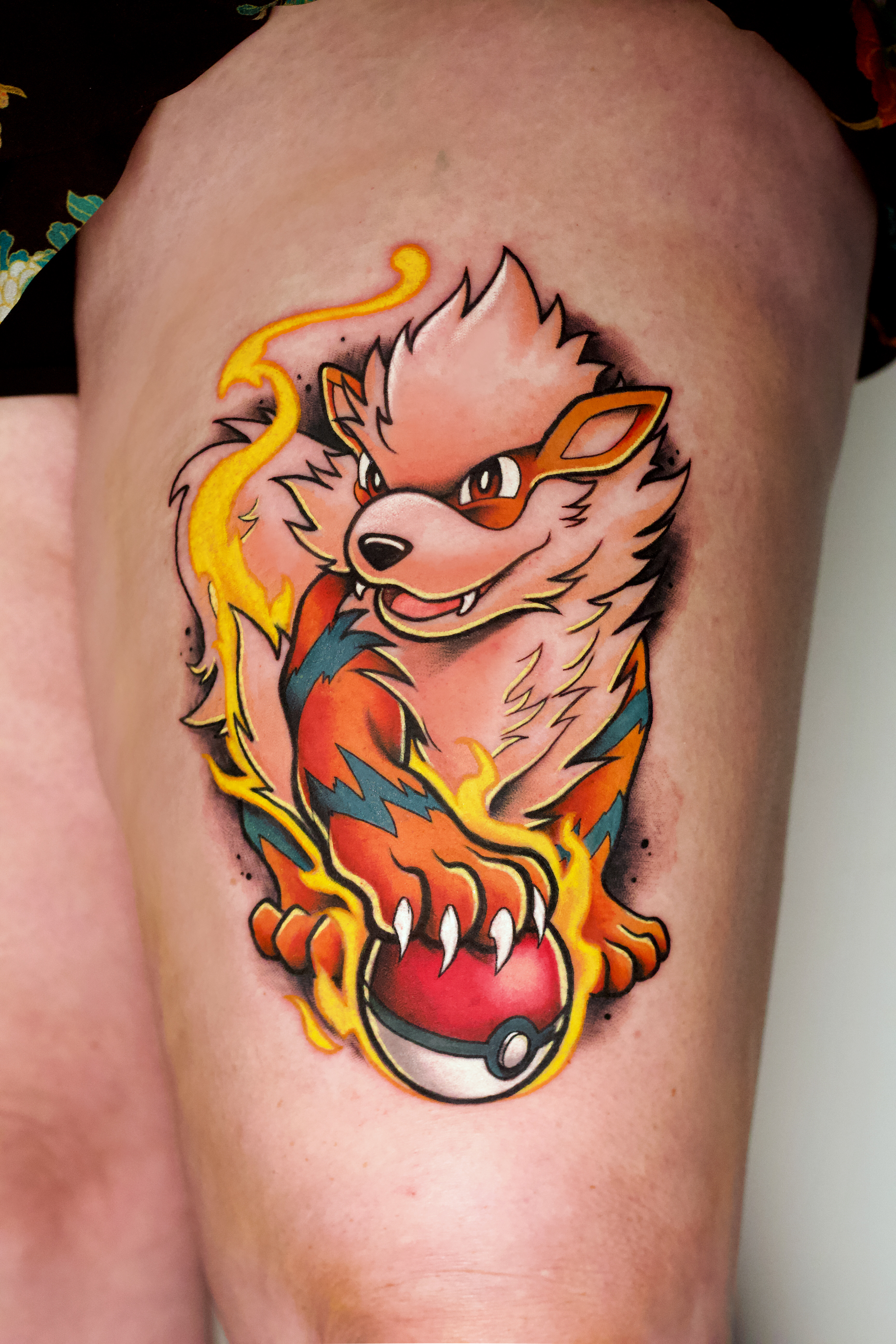 Tatuagem Arcanine Pokémon com Pokébola por Rogério Opix