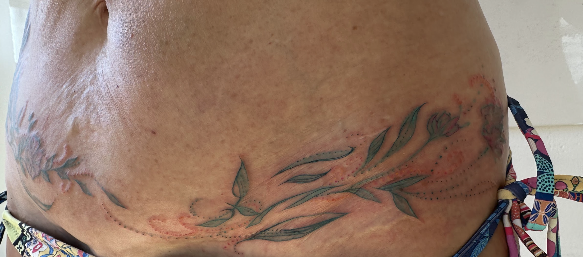 Restorative Botanical Camouflage Flow Tattoo by Justine Almaraz