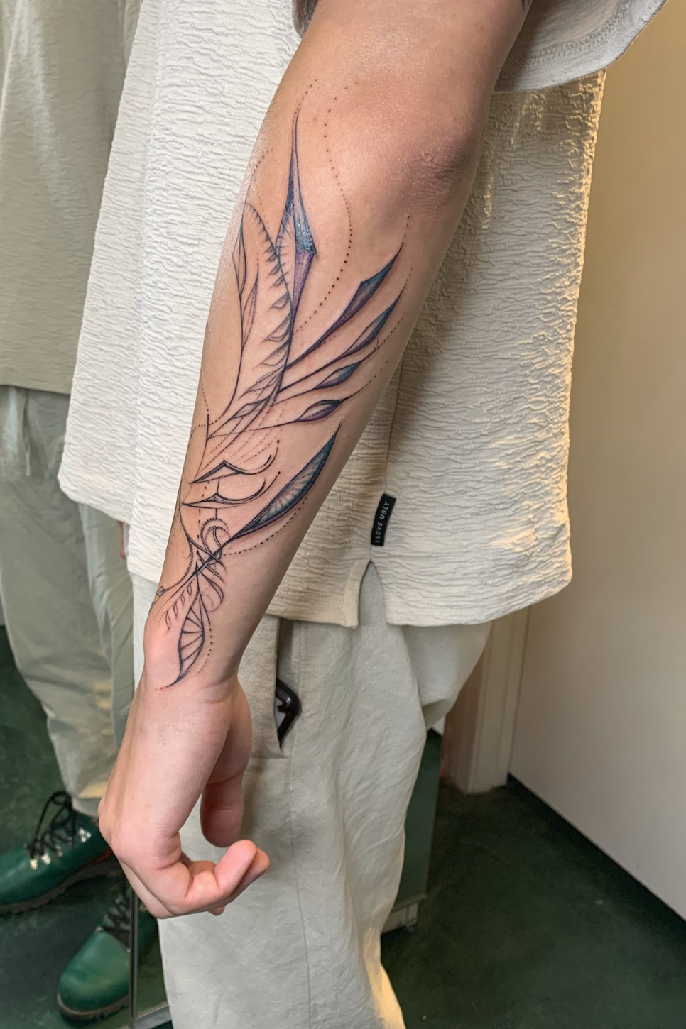 Forearm Resonance & Geometric Botanical Flow Tattoo by Justine Almaraz