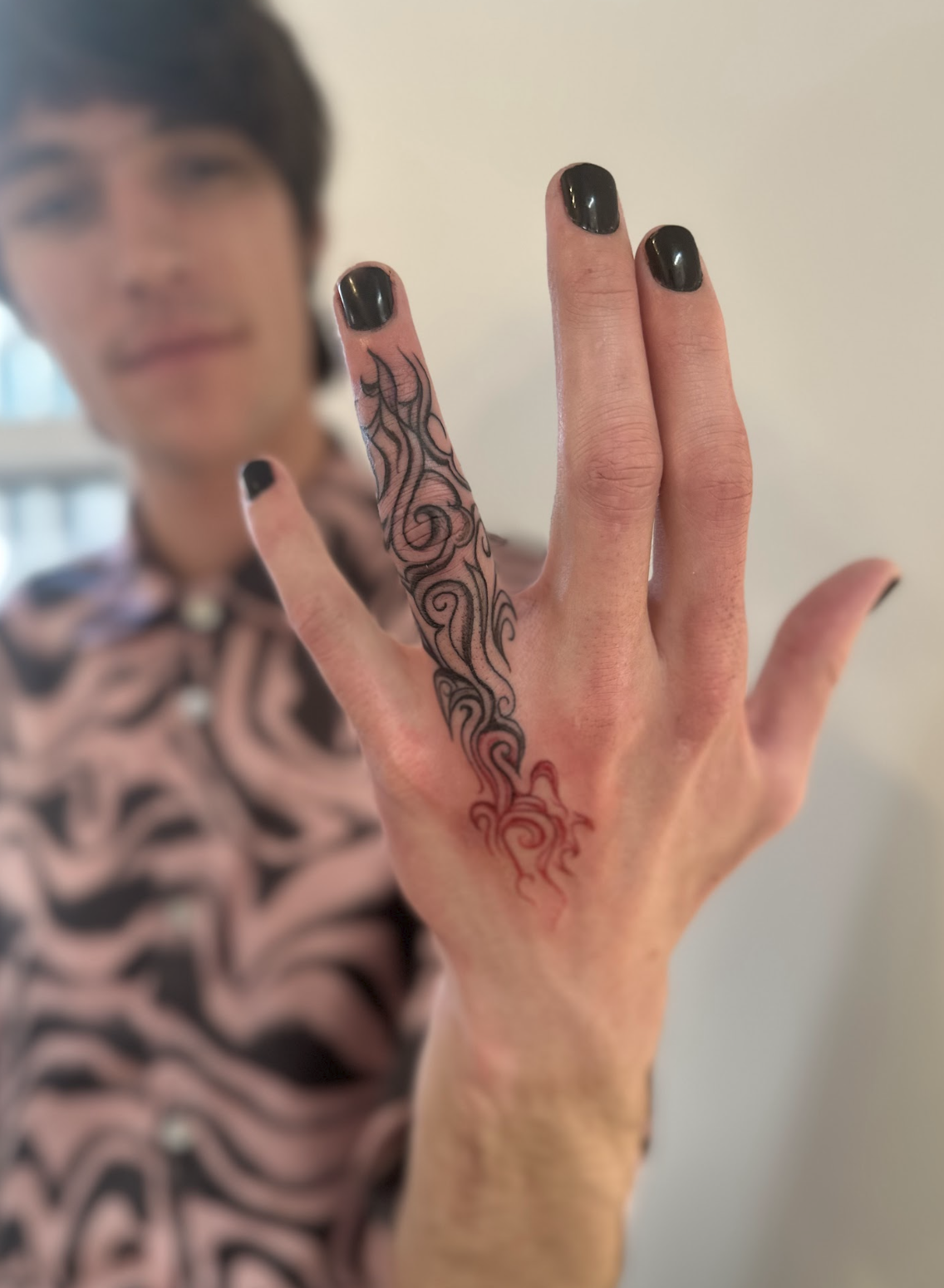 Black & Red Kinetic Flame Swirl Finger & Hand Tattoo by Justine Almaraz