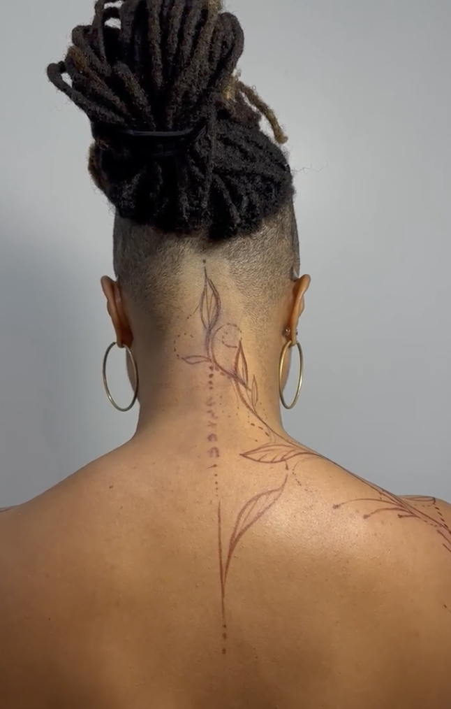 Botanical Spine & Upper Neck Floral Adornment Tattoo by Justine Almaraz