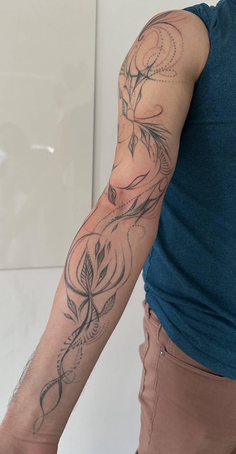 Full Arm Intuitive Resonance & Sacred Flow Tattoo by Justine Almaraz