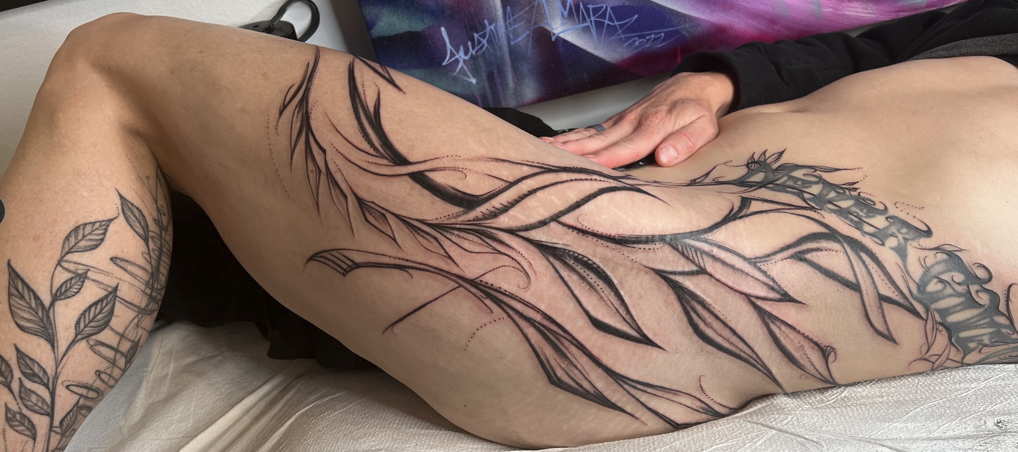 Intuitive Botanical Hip & Torso Flow Camouflage Tattoo by Justine Almaraz