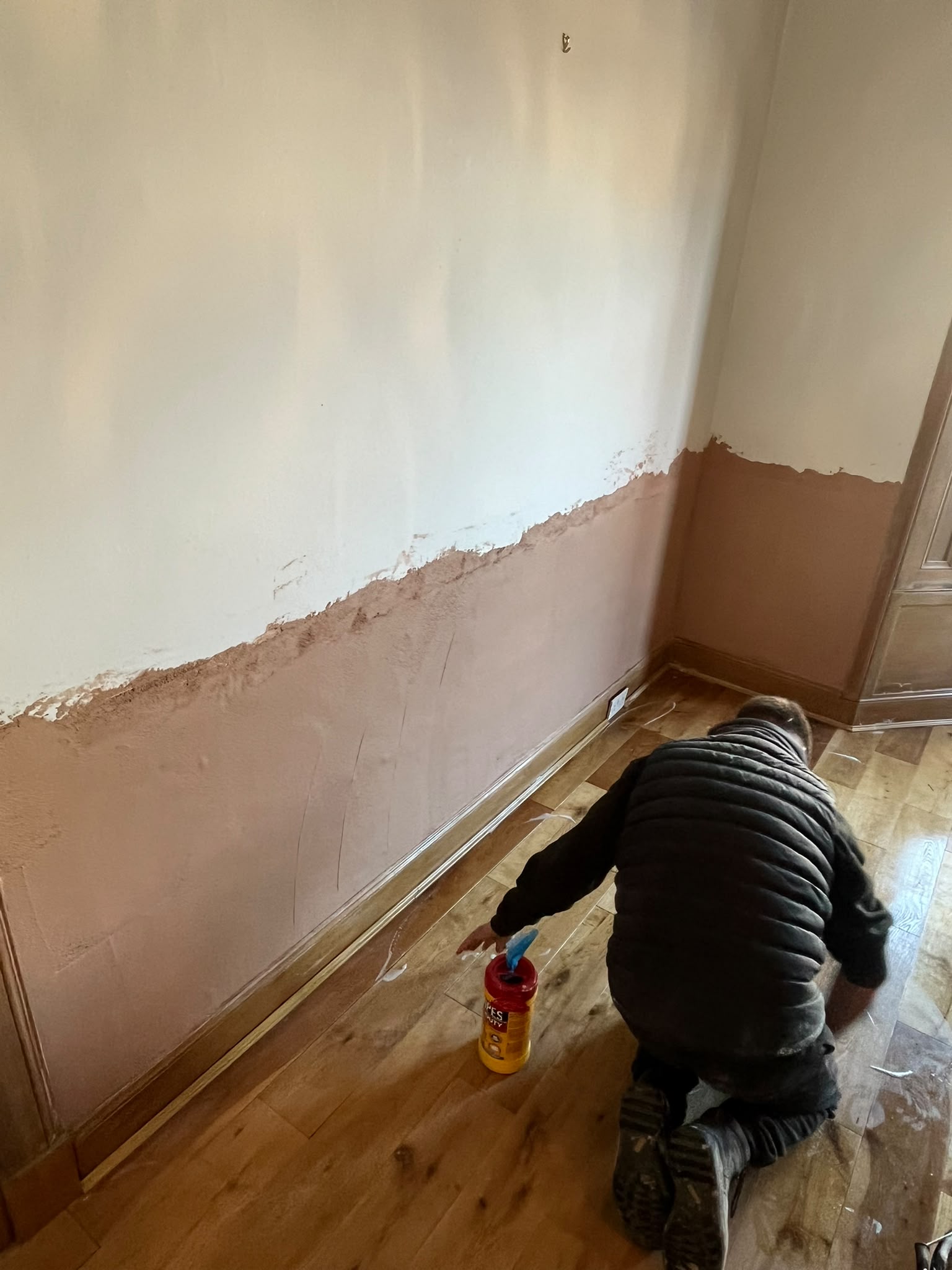 Specialist completing skirting and chemical damp proofing