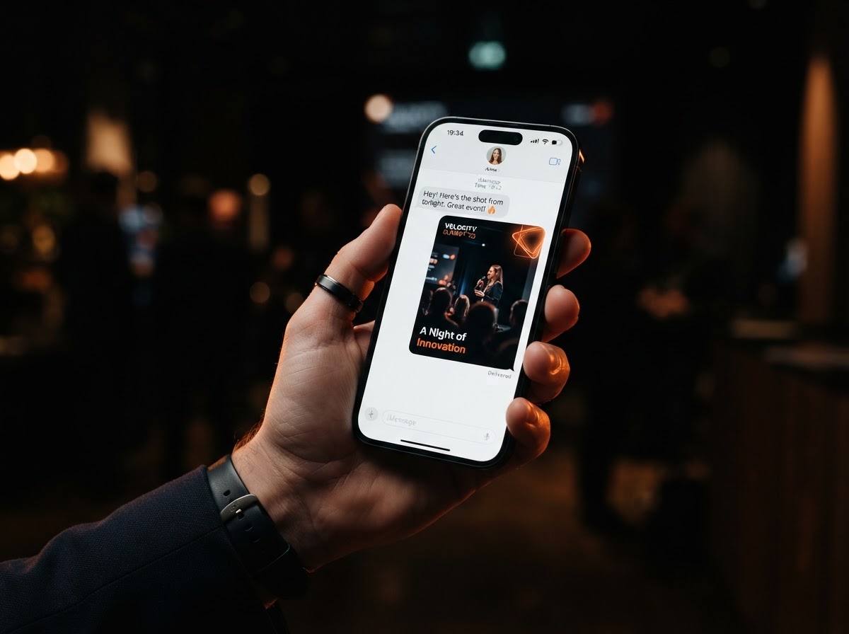 A smartphone showing a branded event digital image delivered in a text messages thread