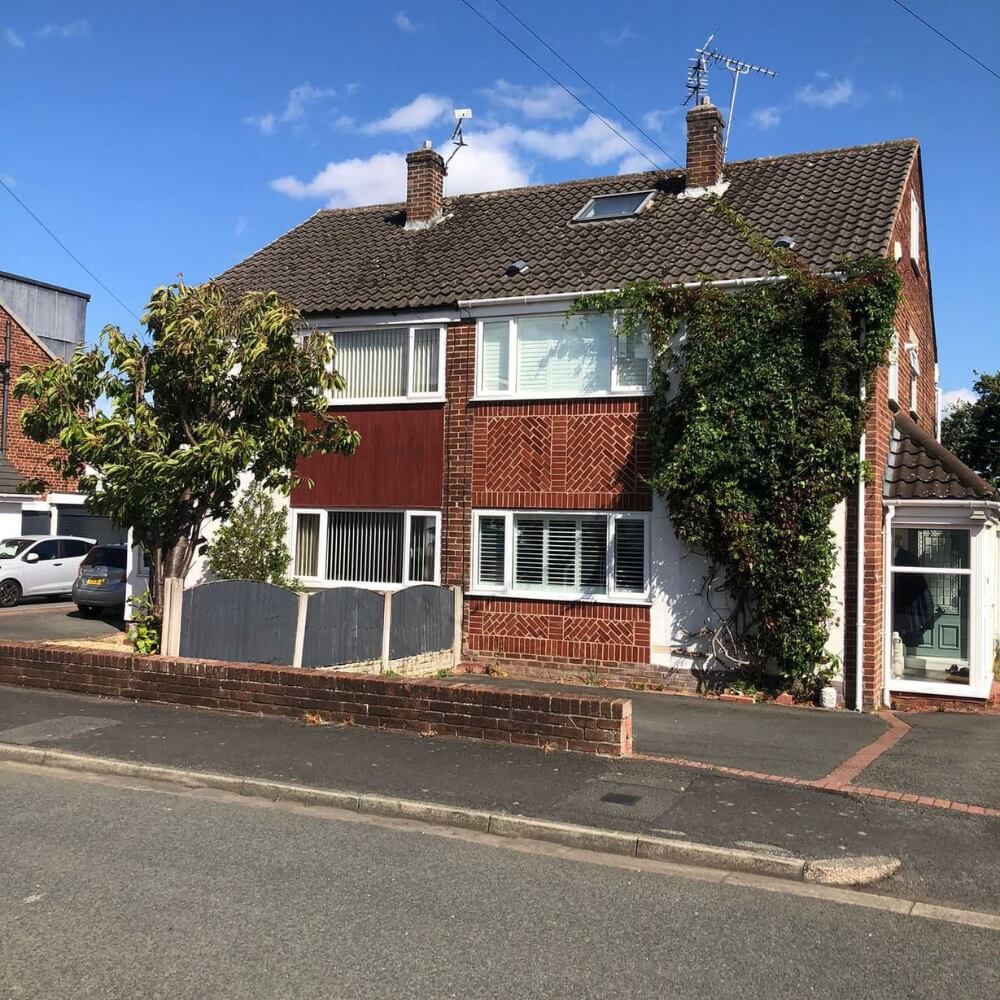Wirral semi-detached red brick property with garden and dormer