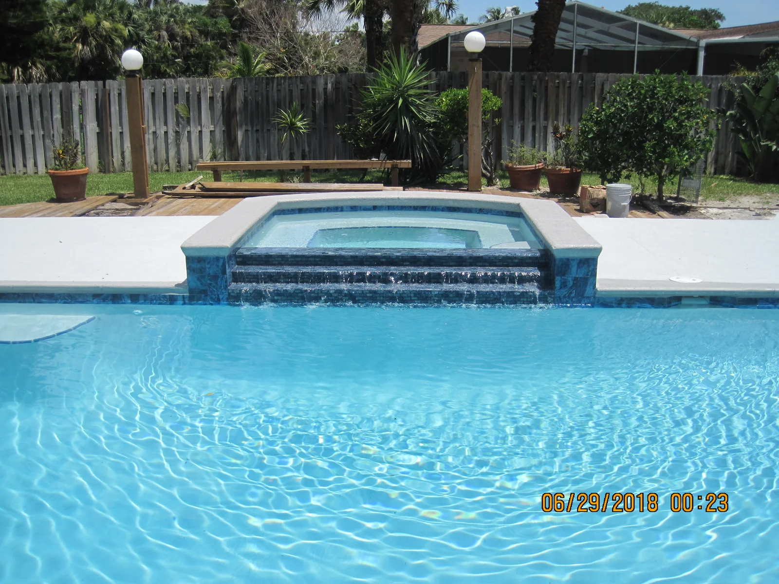 Raised Rectangular Tiered Spillway Spa