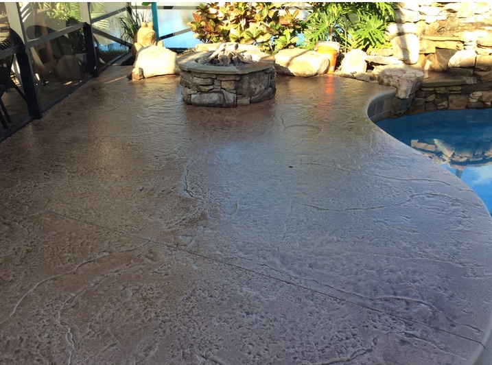 Freeform Pool Deck with Fire Pit & Waterfall
