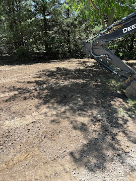 Cleared and graded building lot in a wooded area of Northeast Kansas