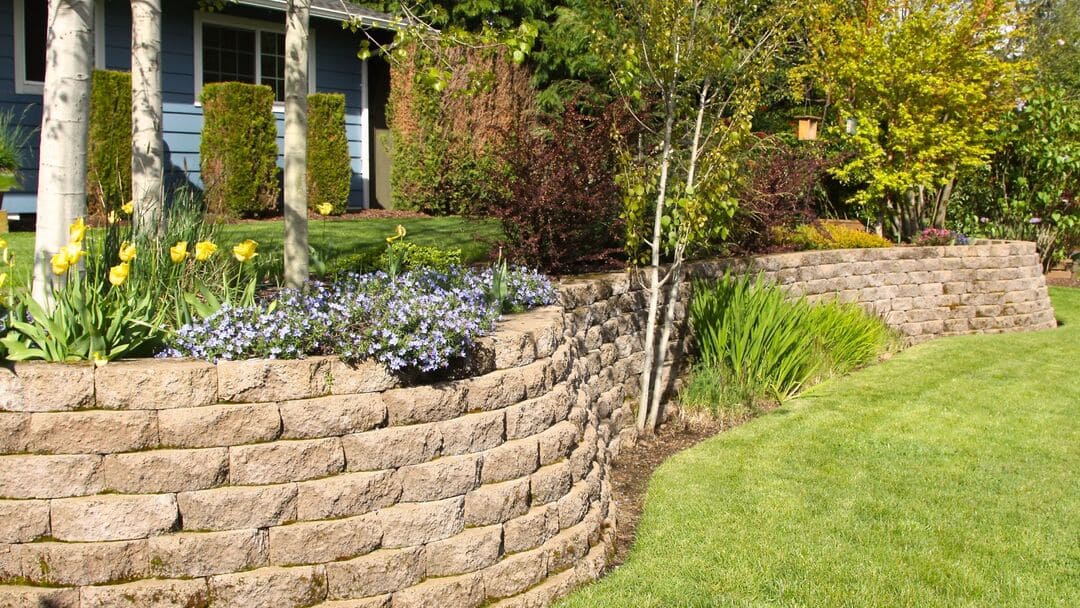 What retaining wall material suits wet coastal blocks?