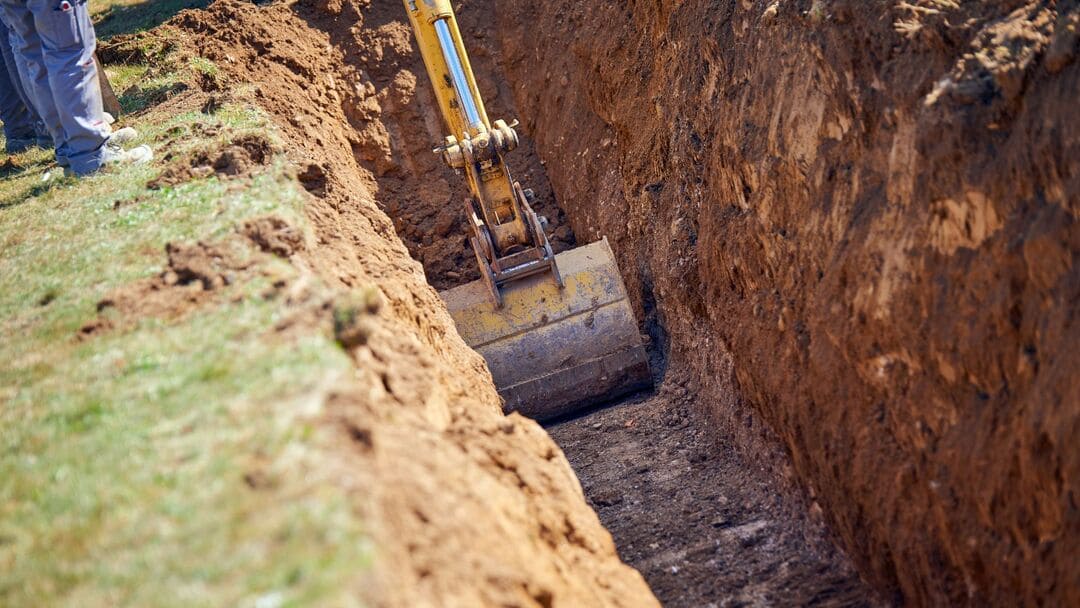 Can you trench around existing pipes and services without damaging them?