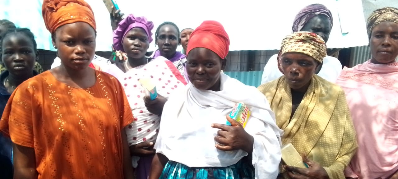 2025 Soap Drive Program Activity 2 - Resilient widows and minor mothers holding soaps
