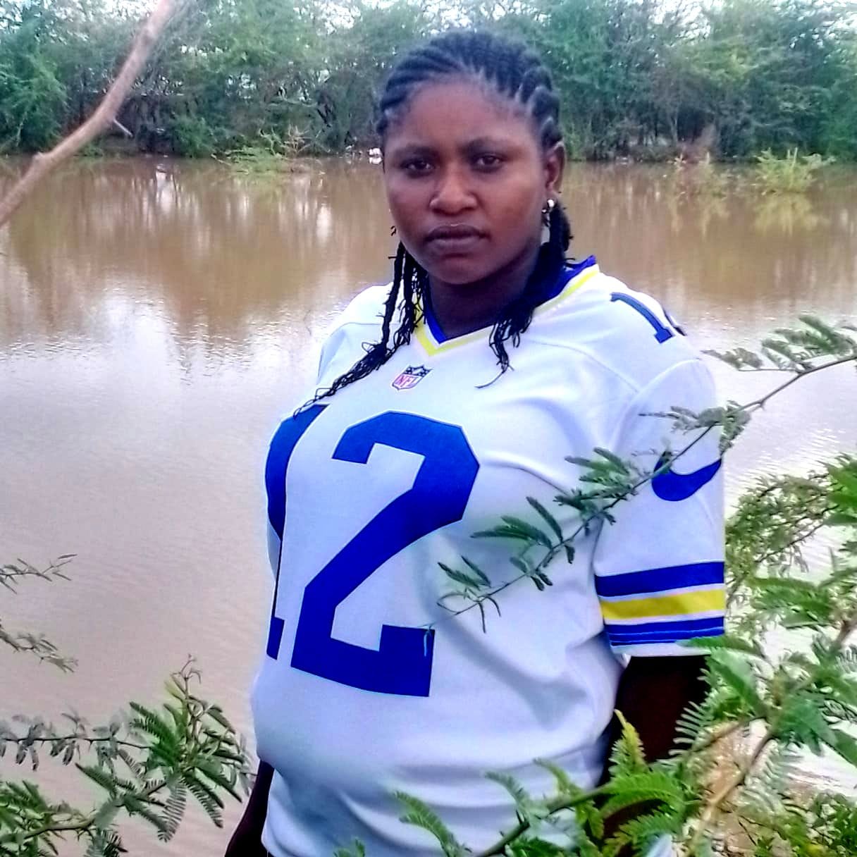 Ivona Ndayizeye at the stagnant rainwater site for the irrigation project