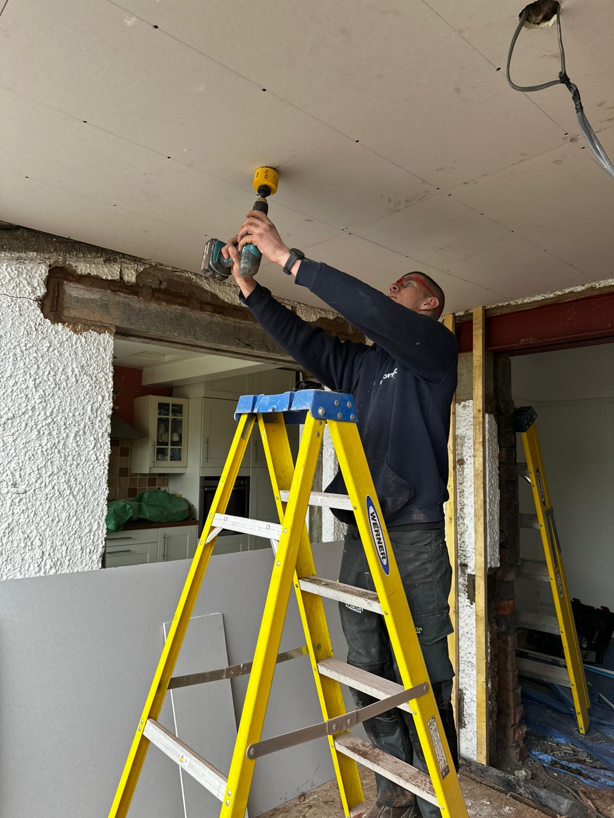 DW Electrical Specialists electrician carrying out electrical installation work