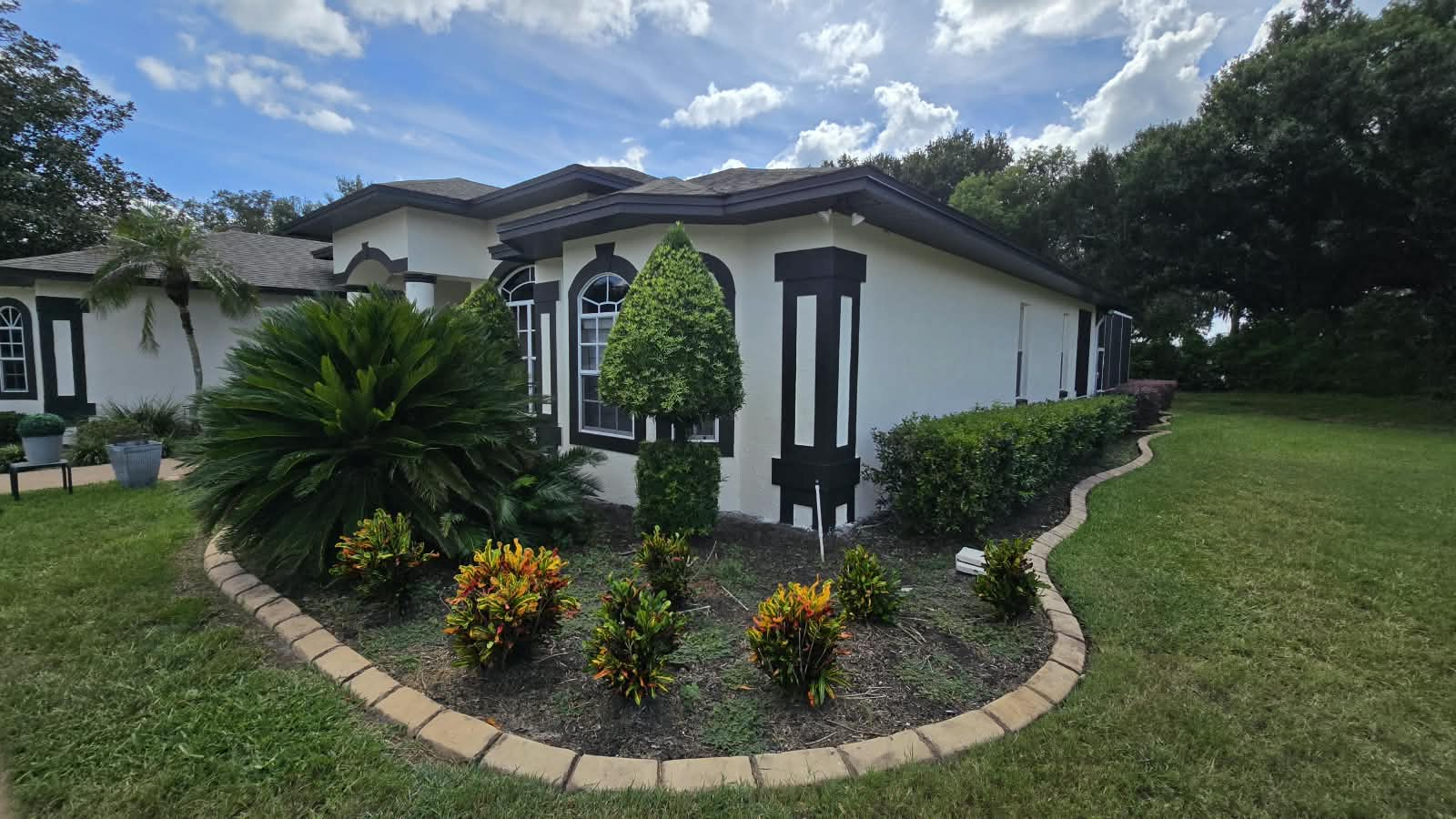 Finished side elevation with sharp architectural pop-outs and crisp contrast lines