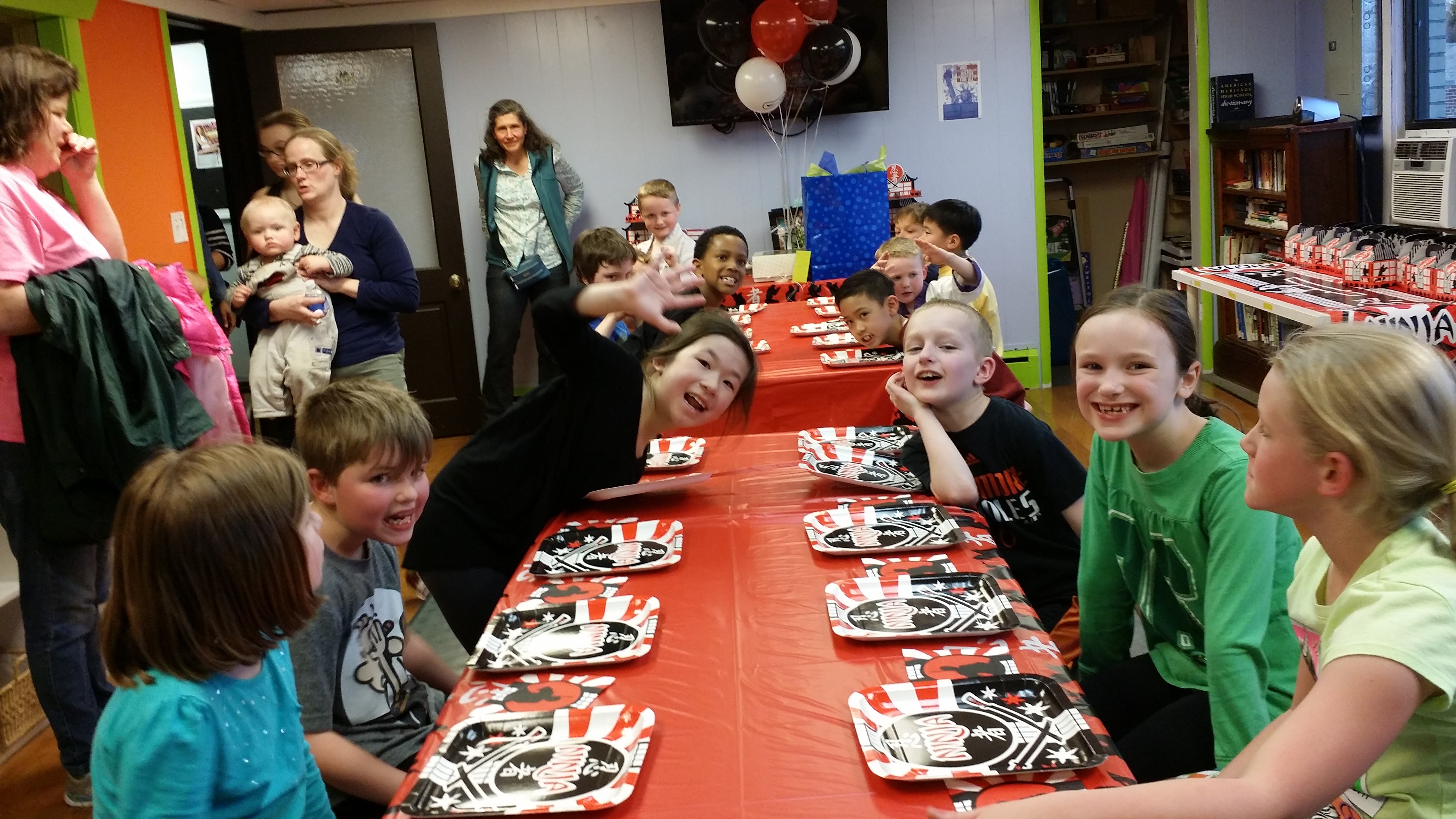 Smiling Kids at the Ninja Party Table