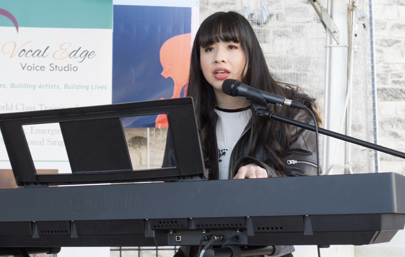 Vocal Edge student performing live on keyboard and vocals
