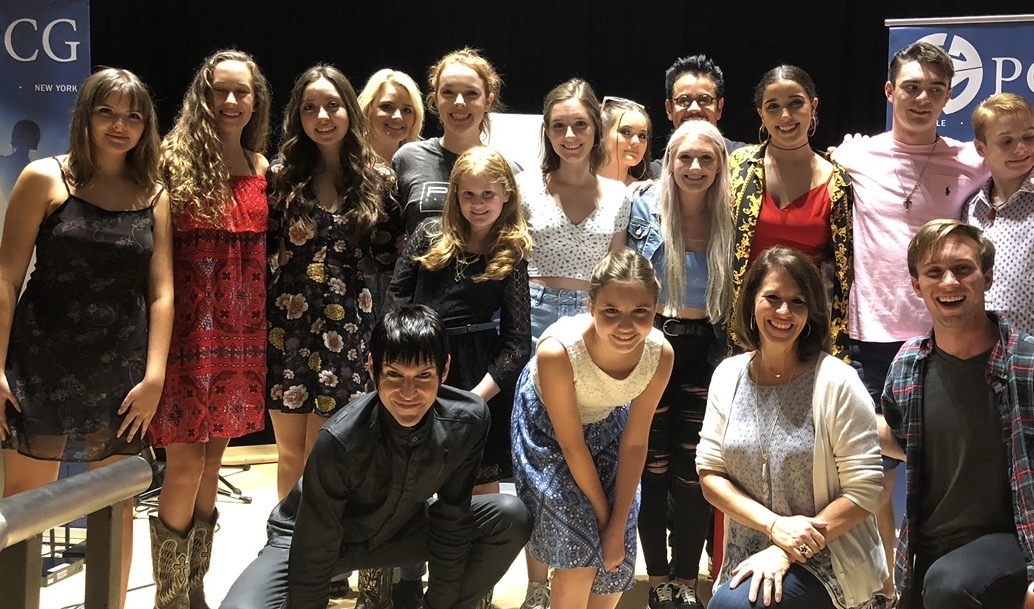Laurie Winckel and Vocal Edge students on stage at PCG Nashville