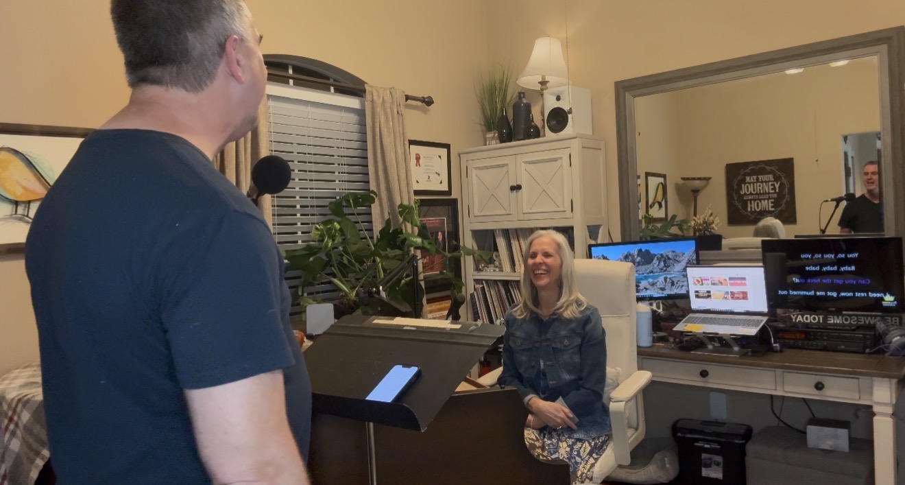 Laurie Winckel coaching vocal student at the piano in the studio